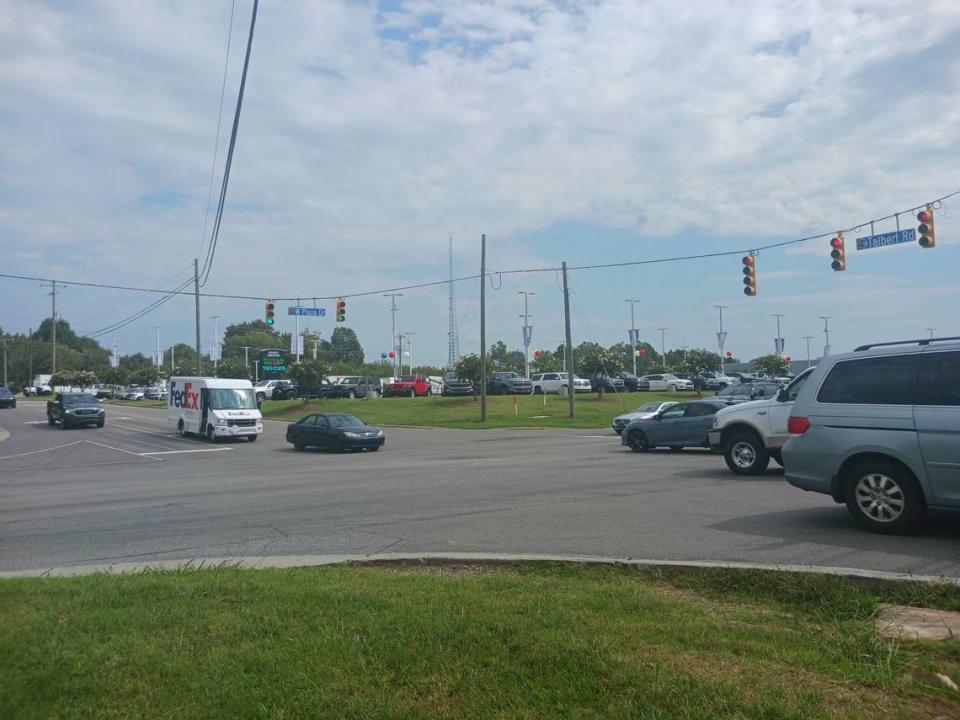 Cars and trucks navigate the Mooresville intersection of N.C. 150 (West Plaza Drive) and Talbert Road at noon Tuesday, Sept. 12, 2023. A developer plans 266 multi-family homes and 18,332 square feet of commercial, retail and restaurant space near the intersection off I-77 Exit 36.