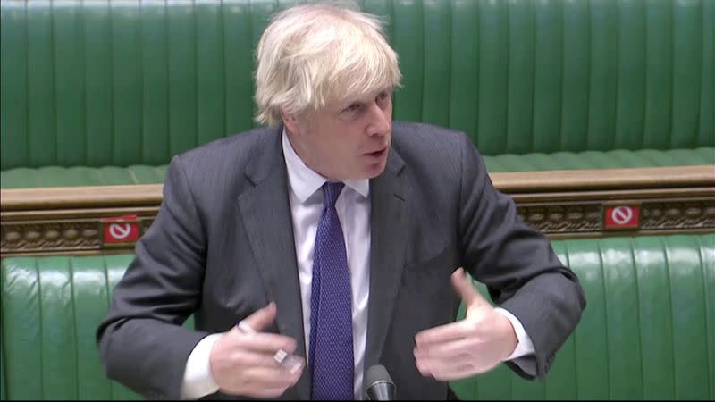 British Prime Minister Boris Johnson takes questions in parliament in London