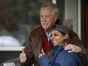 Sen. Angus King, an independent, and his daughter, Molly Herman, show their optimism for King's re-election chances, outside a polling place, Tuesday, Nov. 6, 2018, in Brunswick, Maine. (AP Photo/Robert F. Bukaty)