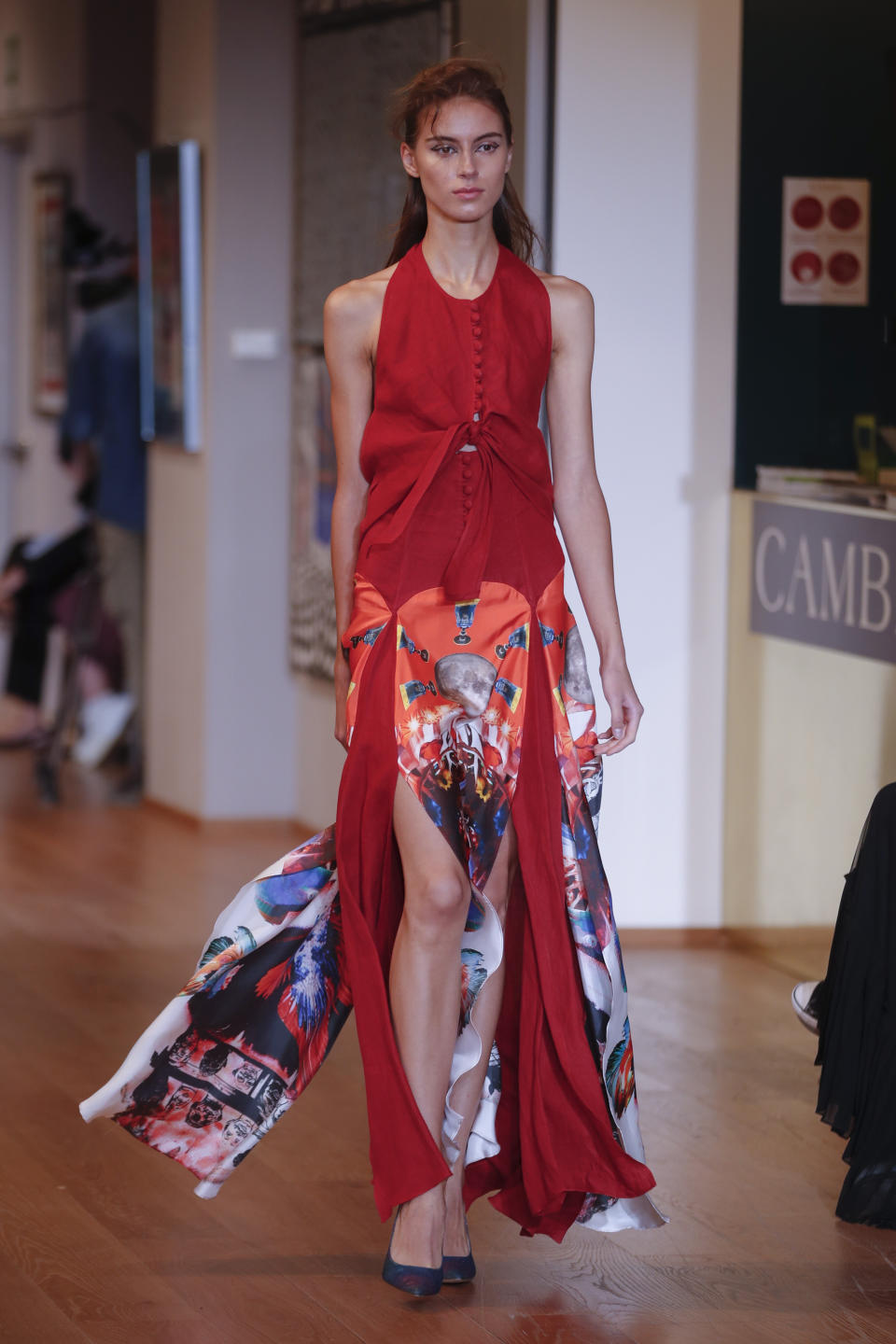 A model wears a creation as part of the Francesco Liberatore 2021 women's spring-summer ready-to-wear collection during the Milan's fashion week in Milan, Italy, Friday, Sept. 25, 2020. (AP Photo/Antonio Calanni)