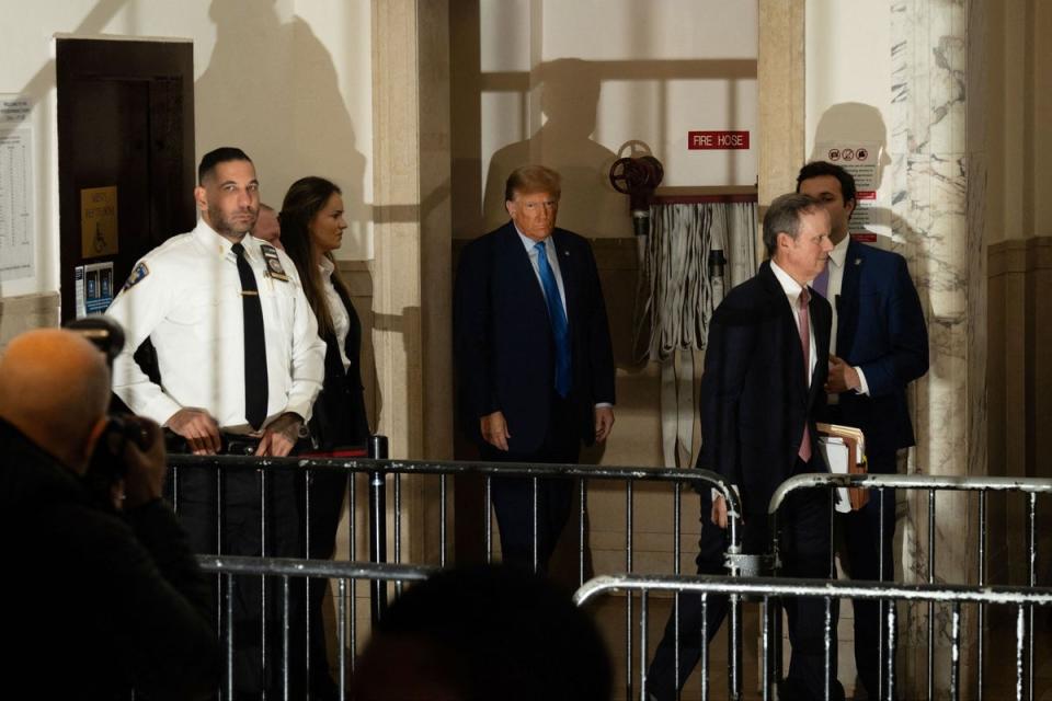 Donald Trump arrives for the civil fraud trial (AFP via Getty Images)