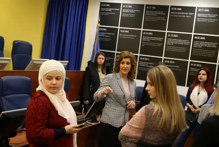 Students are seen at the original courtroom of the United Nations International Criminal Tribunal for the former Yugoslavia (ICTY), as a part of their education, in Sarajevo City Hall, Bosnia and Herzegovina December 7, 2018. Picture taken December 7, 2018. REUTERS/Dado Ruvic