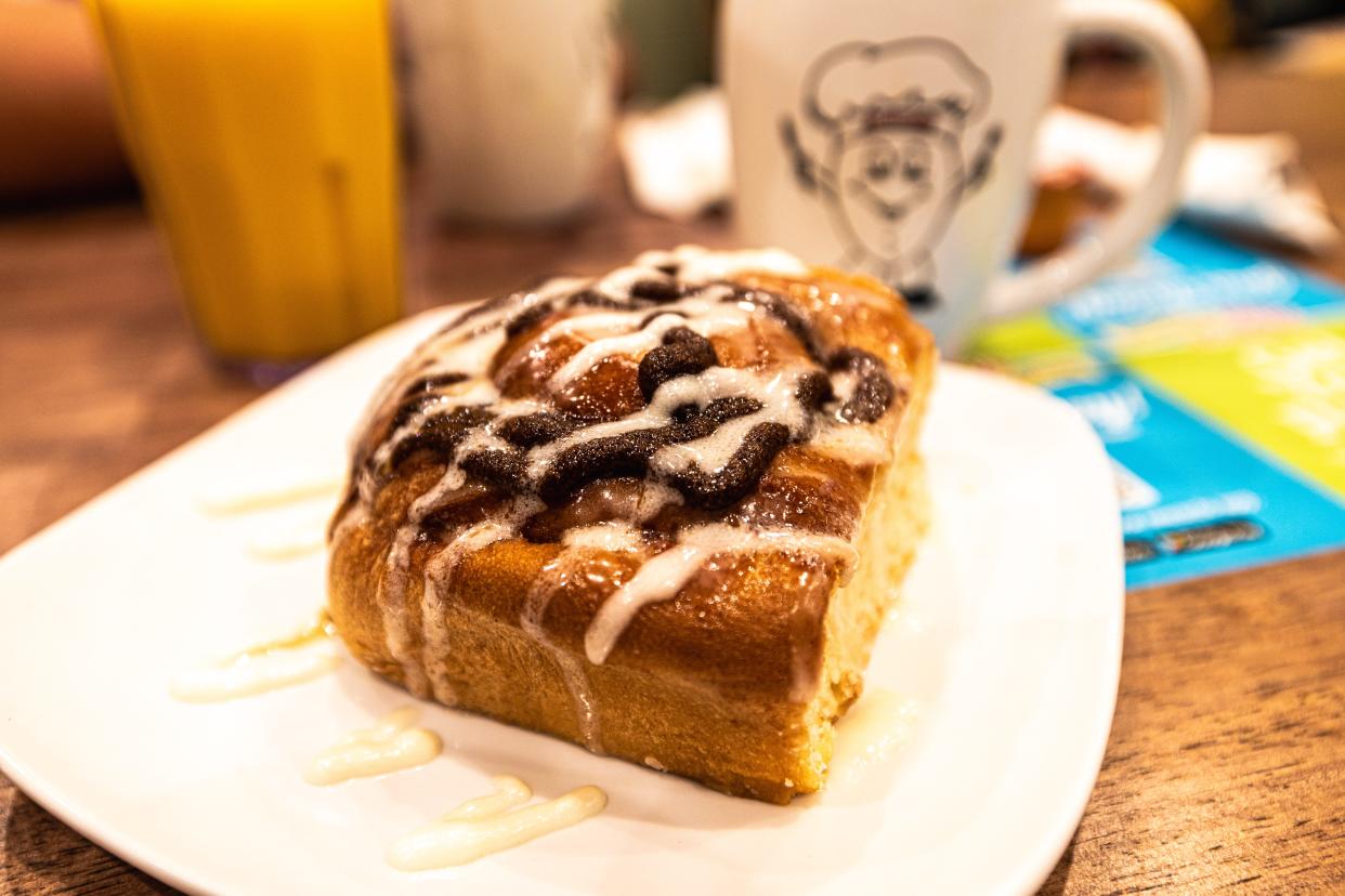 Jimmy's Egg cinnamon roll is light and fluffy covered in glazed icing.