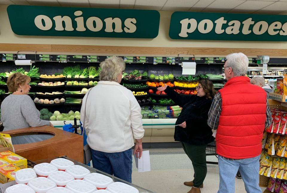 LeeAnn Miller, traveling registered dietitian with Coshocton Regional Medical Center, leads a grocery store walk for the Dining with Diabetes reunion class.