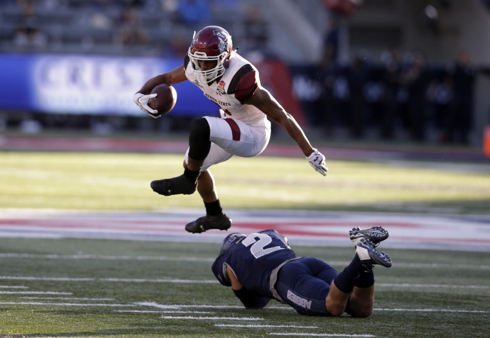 New Mexico State running back Larry Rose III (3) scored the winning TD for NMSU. (AP Photo/Rick Scuteri)