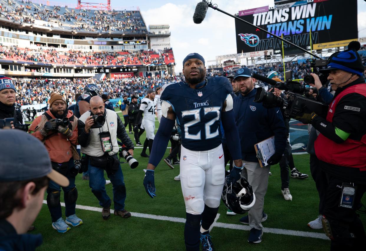 Tennessee Titans running back Derrick Henry (22) heads off the field after possibly his last game as a Titans player after their game at Nissan Stadium in Nashville, Tenn., Sunday, Jan. 7, 2024.