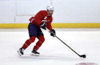 Florida Panthers center Sam Bennett skates with the puck during an NHL hockey training camp Thursday, Sept. 23, 2021, in Sunrise, Fla. (David Santiago/Miami Herald via AP)