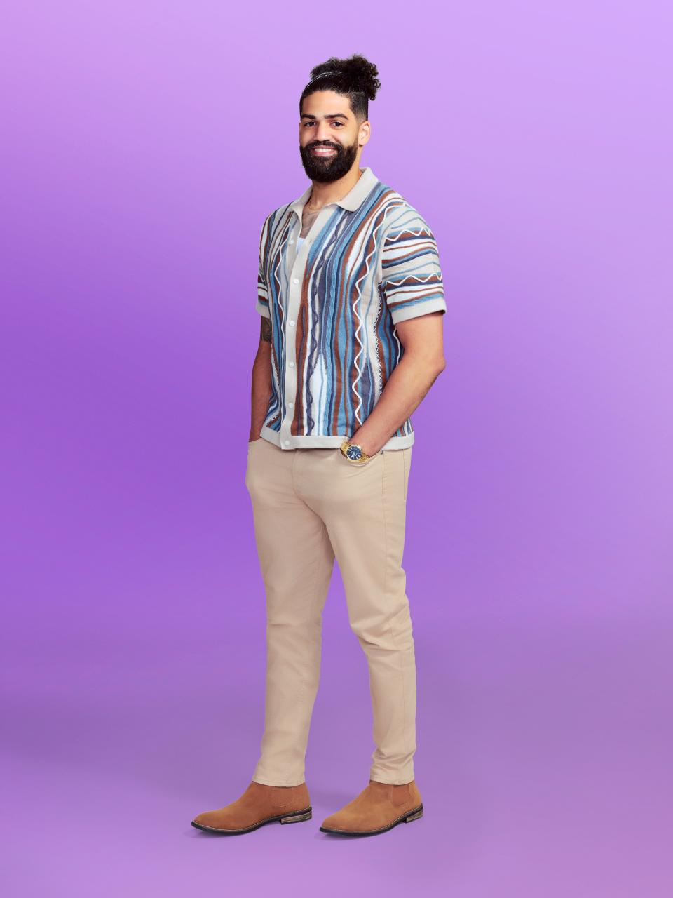 Ariel, a contestant on "Love Is Blind" season 6, wearing a striped shirt and beige pants