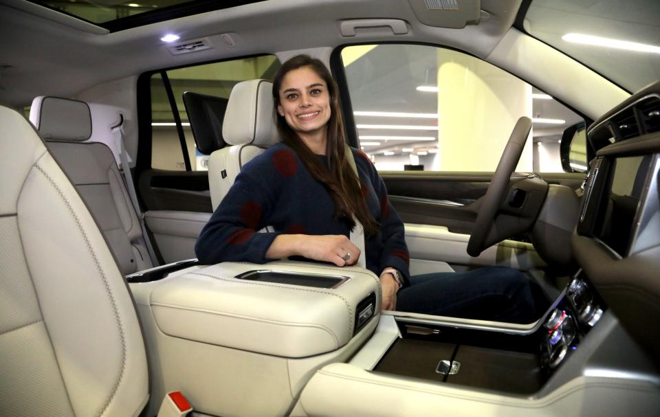 General Motors engineer Alex Archer with the 2021 GMC Yukon on Thursday, January 23, 2020 that she had a role in designing part of the interior.
Archer worked on the new and innovative power console that with the push of a button can slide back and forth to revel lots of storage space giving owners an extra 10-cubic inches of storage in the popular selling SUV.