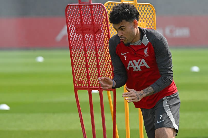 Luis Diaz runs during a Liverpool training session