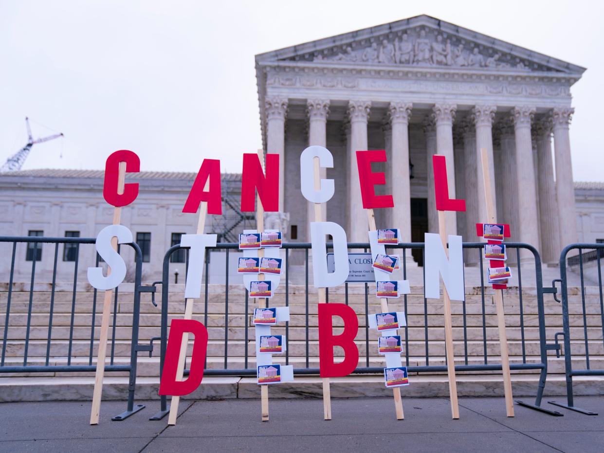 A sign reading "Cancel Student Debt" staged outside of the Supreme Court of the United States in Washington, DC.