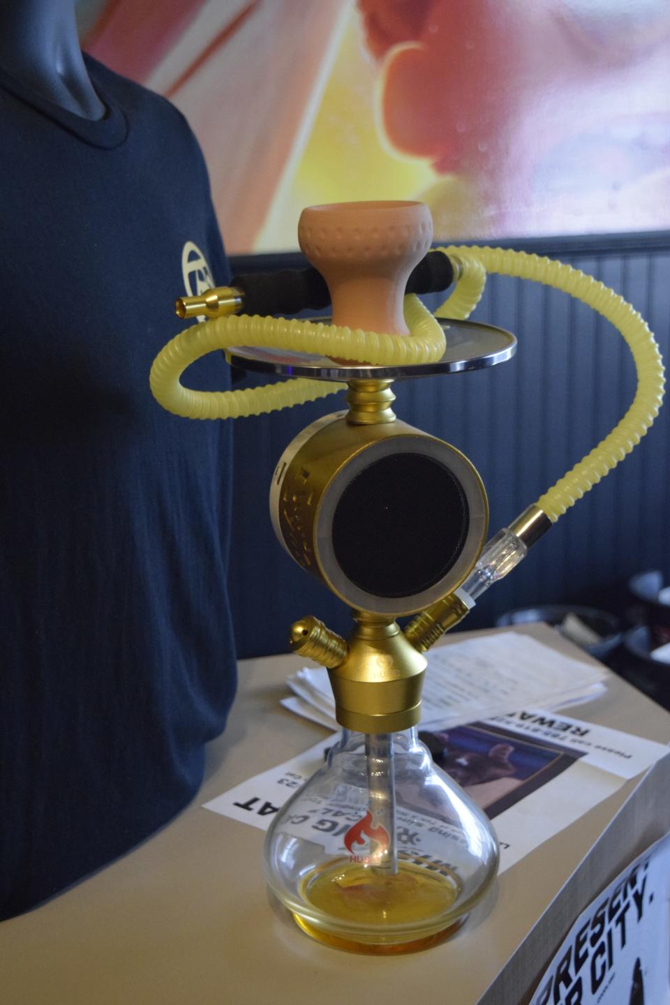 Hookahs, water pipes used to smoke shisha, come in a variety of sizes and abilities. This particular pipe incorporates a Bluetooth speaker into its body.