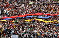 Opposition supporters take part in a rally against Venezuela's President Nicolas Maduro's government in Caracas, Venezuela, October 26, 2016. REUTERS/Christian Veron