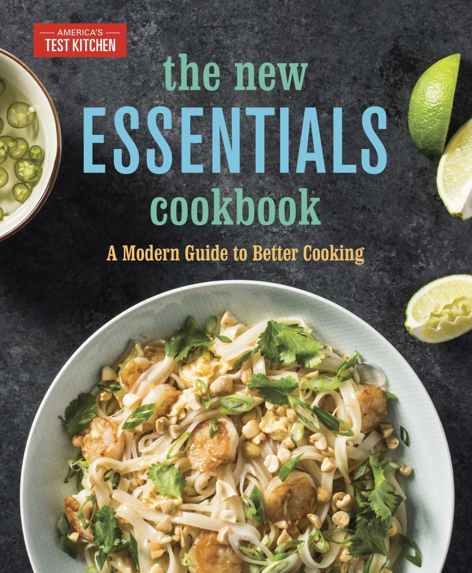 This image provided by America's Test Kitchen in October 2018 shows the cover for “The New Essentials Cookbook.” It includes a recipe for a turkey meatloaf with a ketchup-brown sugar glaze. (America's Test Kitchen via AP)