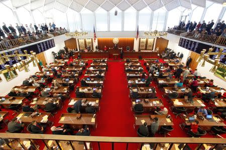 North Carolina's House of Representatives convenes as the legislature considers repealing the controversial HB2 law limiting bathroom access for transgender people in Raleigh, North Carolina, U.S. on December 21, 2016. REUTERS/Jonathan Drake