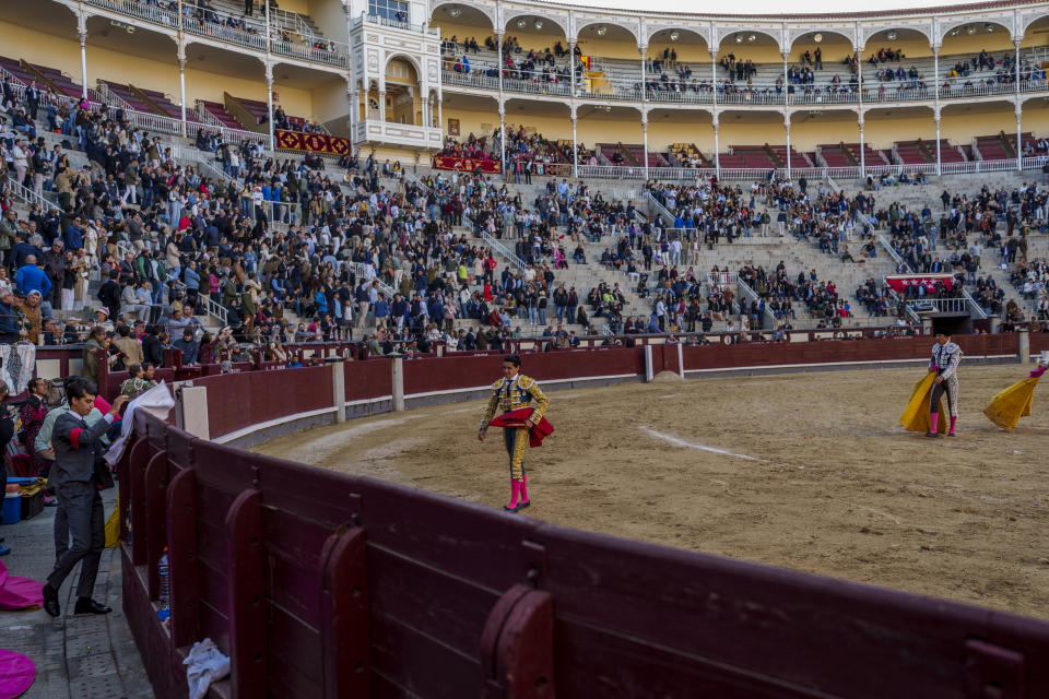 Ecuadorian bullfighter Mario Navas walks on the ring after killing a brave Fuente Ymbro ranch fighting small bull at Las Ventas bullring in Madrid, Spain, Sunday, March 26, 2023. The death of Spanish bullfighting has been declared many times, but the number of bullfights in the country is at its highest level in seven years, and the young are the most consistent presence as older groups of spectators drop away. (AP Photo/Manu Fernandez)