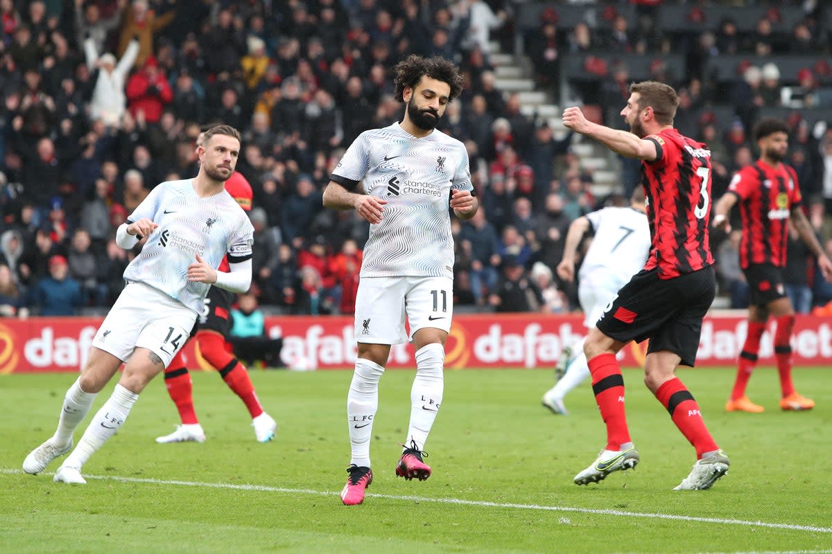 Liverpool’s Mohamed Salah, centre, looks frustrated after missing a penalty (Kieran Cleeves/PA) (PA Wire)