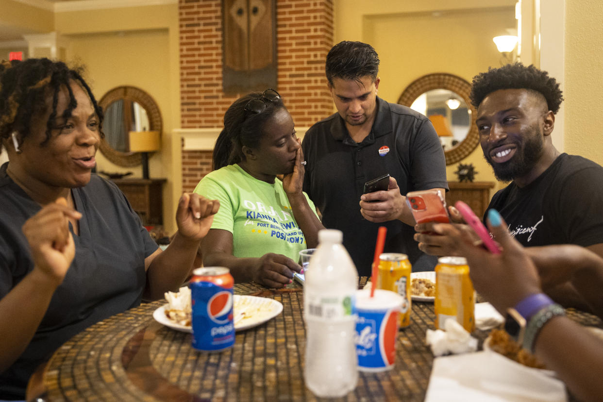 School board trustee hopeful Orjanel Lewis checks results during her Election Day watch party on May 7, 2022, in Fresno, Texas. (Annie Mulligan for NBC News)