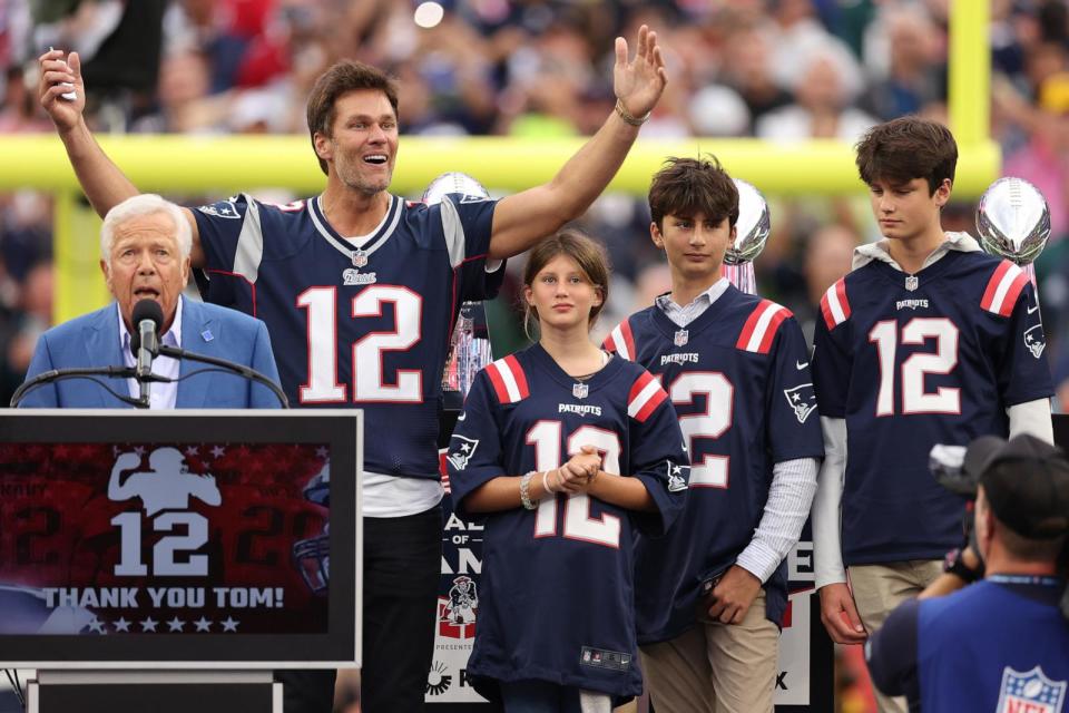 PHOTO: New England Patriots owner Robert Kraft speaks next to former New England Patriots quarterback Tom Brady and his three children, Vivian, left, Benjamin, center, and Jack, at Gillette Stadium, Sept. 10, 2023, in Foxborough, Mass. (Maddie Meyer/Getty Images, FILE)