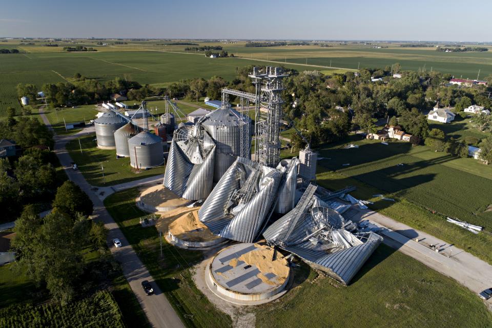 In this aerial image from a drone, damaged grain bins are shown at the Heartland Co-Op grain elevator on August 11, 2020, in Luther, Iowa. Iowa Gov. Kim Reynolds said early estimates indicate 10 million acres, nearly a 1/3 of the states land used for crops, were damaged when a powerful storm battered the region a day earlier.