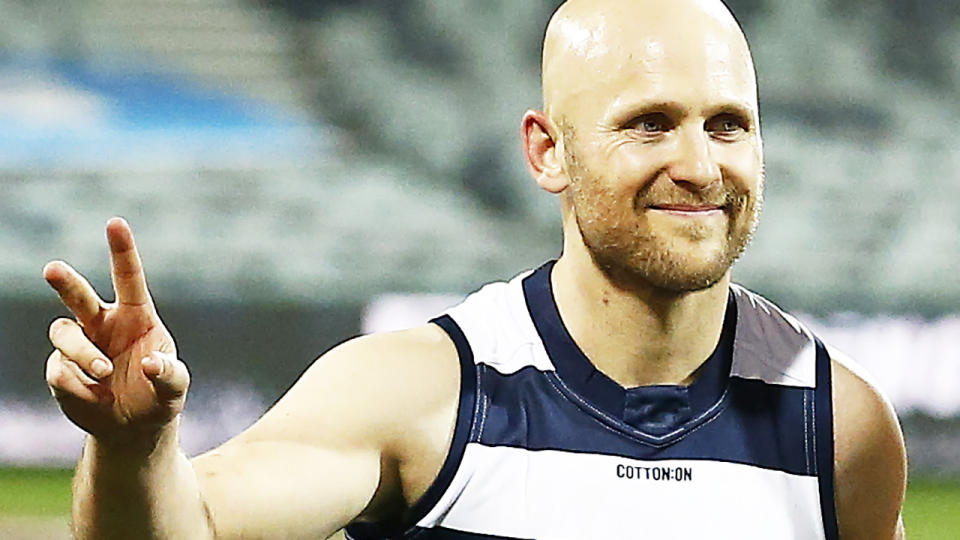 Geelong AFL player Gary Ablett is pictured walking off the field.