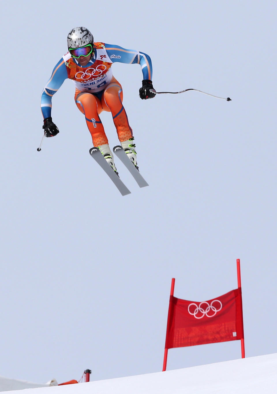 Norway's Aksel Lund Svindal jumps during the men's downhill at the Sochi 2014 Winter Olympics, Sunday, Feb. 9, 2014, in Krasnaya Polyana, Russia.(AP Photo/Luca Bruno)