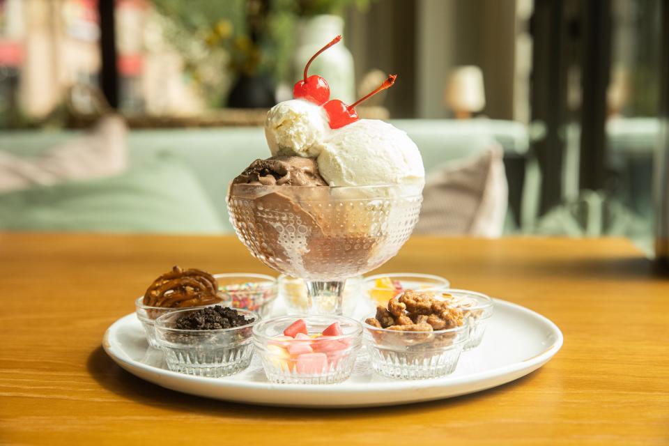 The dessert menu at Evelyn's in the Hutton Hotel features an elaborate ice cream sundae for two.