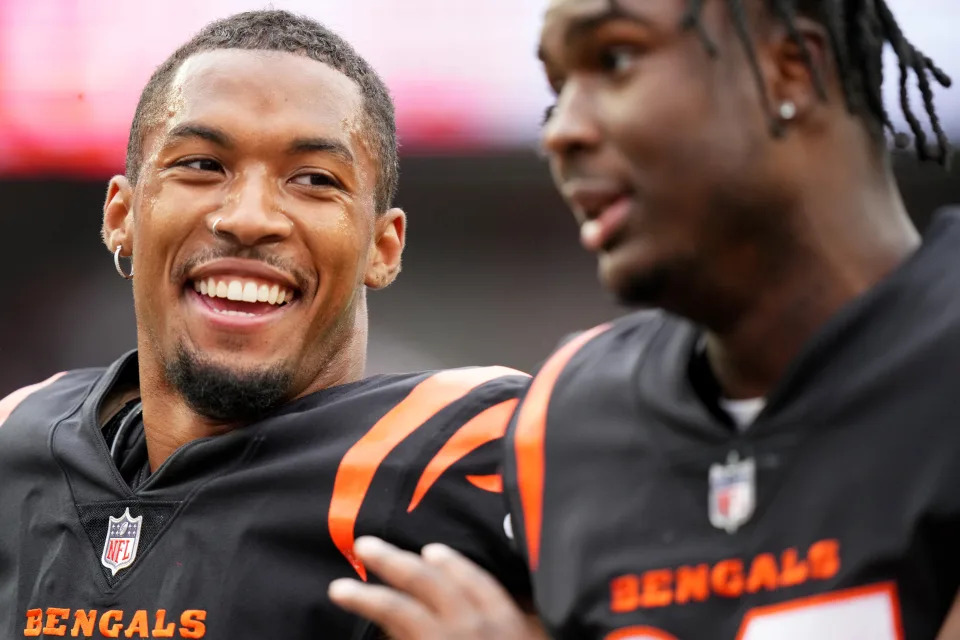 Cincinnati Bengals cornerback DJ Turner II (20), left, and Cincinnati Bengals safety Jordan Battle (27), right, walk off the field at the conclusion of an NFL football game between the Seattle Seahawks and the Cincinnati Bengals Sunday, Oct. 15, 2023, at Paycor Stadium in Cincinnati. The Cincinnati Bengals won, 17-13.