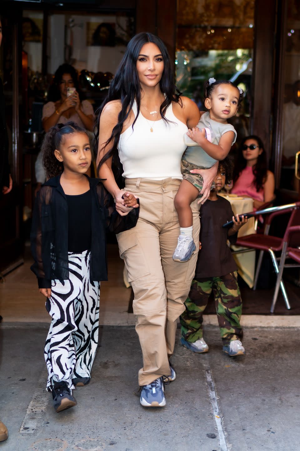 <p>Mother-of-four <a href="https://www.elle.com/uk/life-and-culture/a34697937/kim-kardashian-north-west/" rel="nofollow noopener" target="_blank" data-ylk="slk:Kim Kardashian" class="link rapid-noclick-resp">Kim Kardashian</a>, who shares her children with her ex-husband <a href="https://www.elle.com/uk/life-and-culture/a35569280/kim-kardashian-kanye-west-divorce/" rel="nofollow noopener" target="_blank" data-ylk="slk:Kanye West" class="link rapid-noclick-resp">Kanye West</a>, is known for sharing details about life with her children. </p><p>Eldest daughter North, eight, has been particularly in the spotlight as of late, due to her <a href="https://www.elle.com/uk/life-and-culture/culture/a38524283/kim-kardashian-north-safety-mason-disick/" rel="nofollow noopener" target="_blank" data-ylk="slk:TikTok footage" class="link rapid-noclick-resp">TikTok footage</a>. </p><p>One of the sweetest things the <a href="https://www.elle.com/uk/fashion/a34781235/skims-uk-kim-kardashian/" rel="nofollow noopener" target="_blank" data-ylk="slk:SKIMS" class="link rapid-noclick-resp">SKIMS </a>founder has said was during an episode of E! True Hollywood Story in 2019.</p><p>'I just love being a mum. It’s exhausting, it’s gruelling, but it’s the best,' she said, per<a href="https://www.usmagazine.com/celebrity-moms/pictures/kim-kardashians-greatest-quotes-about-motherhood/worth-it/" rel="nofollow noopener" target="_blank" data-ylk="slk:US Magazine" class="link rapid-noclick-resp"> US Magazine</a>. </p><p>The 41-year-old, who had her last two children Chicago and Psalm, via a surrogate, said on <a href="https://www.youtube.com/watch?v=R7LwZFTjrzA" rel="nofollow noopener" target="_blank" data-ylk="slk:The Tonight Show" class="link rapid-noclick-resp">The Tonight Show</a> with Jimmy Fallon in 2019 ahead of the birth of her fourth child: 'I was kind of stressing that my house is so full, but I heard that parents of four are the most enlightened and calm of all parents.'</p><p>Recently, during a conversation with journalist Bari Weiss, the <a href="https://www.elle.com/uk/life-and-culture/culture/a33963626/keeping-up-with-the-kardashians-red-flags-end/" rel="nofollow noopener" target="_blank" data-ylk="slk:Keeping Up With The Kardashians" class="link rapid-noclick-resp">Keeping Up With The Kardashians </a>star said that daughter North intimidates her more than politicians. </p>