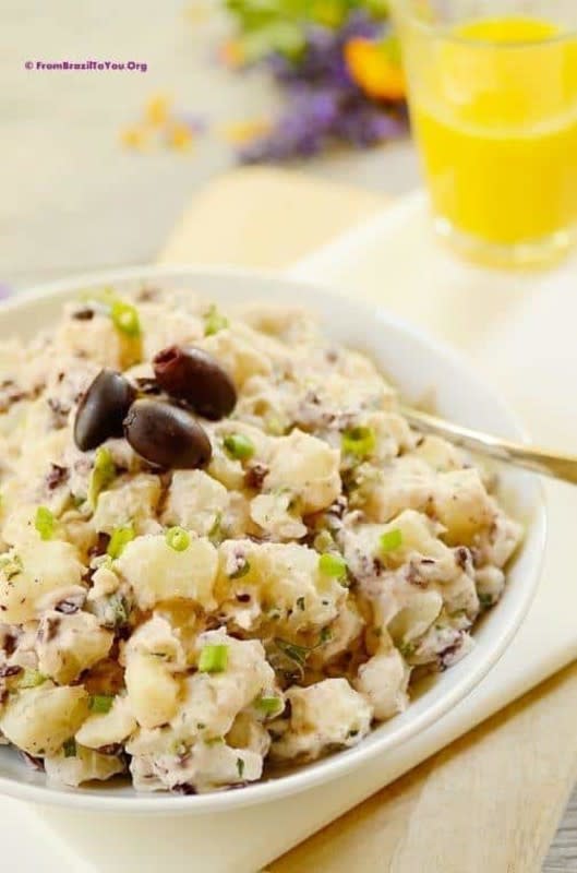 <p>An easy recipe made with cubed potatoes, mayonnaise, lime juice, olives, garlic, onions and herbs. It's a great summer side dish, ideal for accompanying grilled meats! <strong>Get the Recipe: <a href="https://www.easyanddelish.com/brazilian-potato-salad/" rel="nofollow noopener" target="_blank" data-ylk="slk:Brazilian Potato Salad;elm:context_link;itc:0;sec:content-canvas" class="link rapid-noclick-resp">Brazilian Potato Salad</a></strong></p>