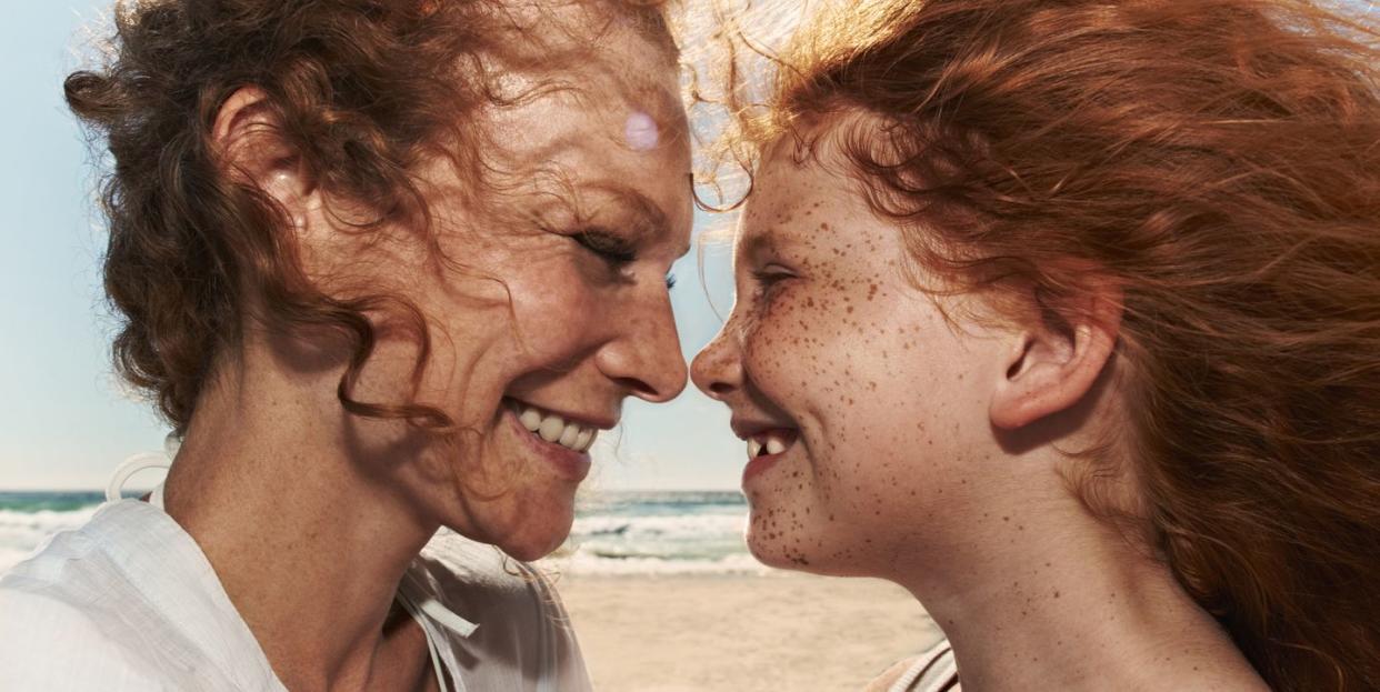 portrait of mother with daughter, close up