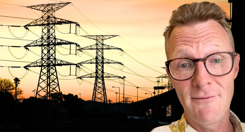 Energy expert Joel Gibson on a background of powerlines.