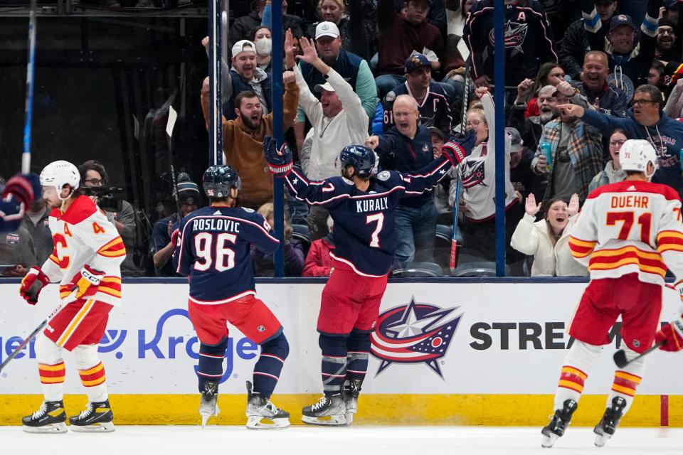 Oct 20, 2023; Columbus, Ohio, USA; Columbus Blue Jackets center Sean Kuraly (7) celebrates scoring a goal with center Jack Roslovic (96) during the second period of the NHL hockey game against the Calgary Flames at Nationwide Arena.