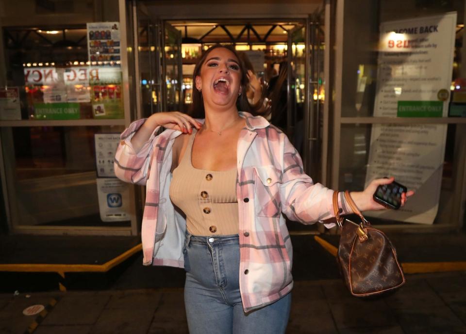 People leave a Wetherspoons pub in Brighton (PA)