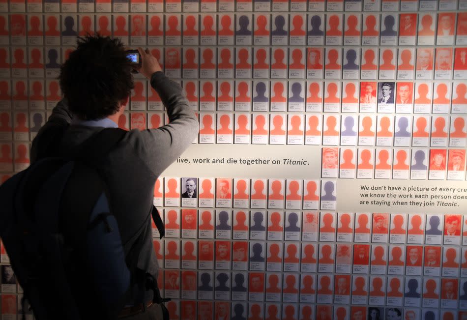 A visitor to SeaCity Museum looks at a board showing the number of Titanic crew lost at the museum's Titanic exhibition on April 3, 2012 in Southampton, England.