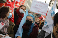 FILE - In this Wednesday, Jan. 20, 2021 file photo students demonstrate in Paris to demand to be allowed back to class, and to call attention to suicides and financial troubles among students cut off from friends, professors and job opportunities amid the pandemic. (AP Photo/Christophe Ena, File)