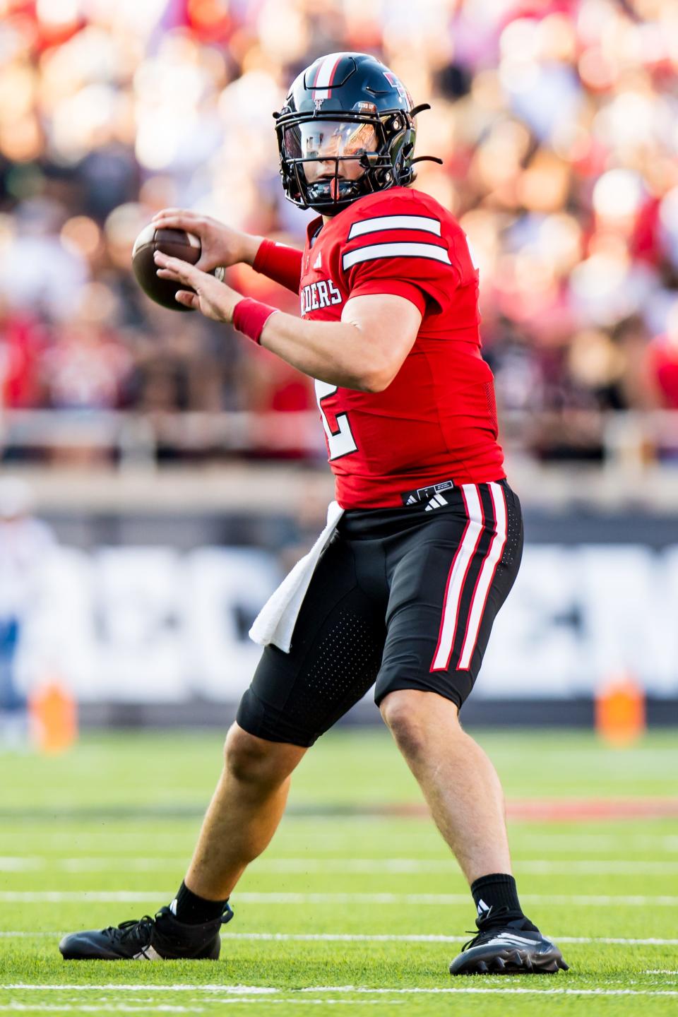 Behren Morton #2 of Texas Tech Red Raiders passes the ball during the first half of the game against the Abilene Christian Wildcats at Jones AT&T Stadium on August 31, 2024 in Lubbock, Texas.