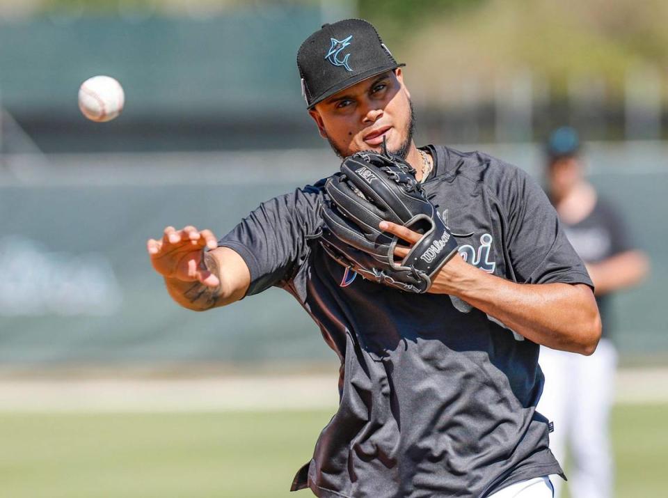 Miami Marlins infielder Luis Arraez throws a ball during a fielding drill during spring training at Roger Dean Chevrolet Stadium in Jupiter, Florida on Tuesday, February 21, 2023.