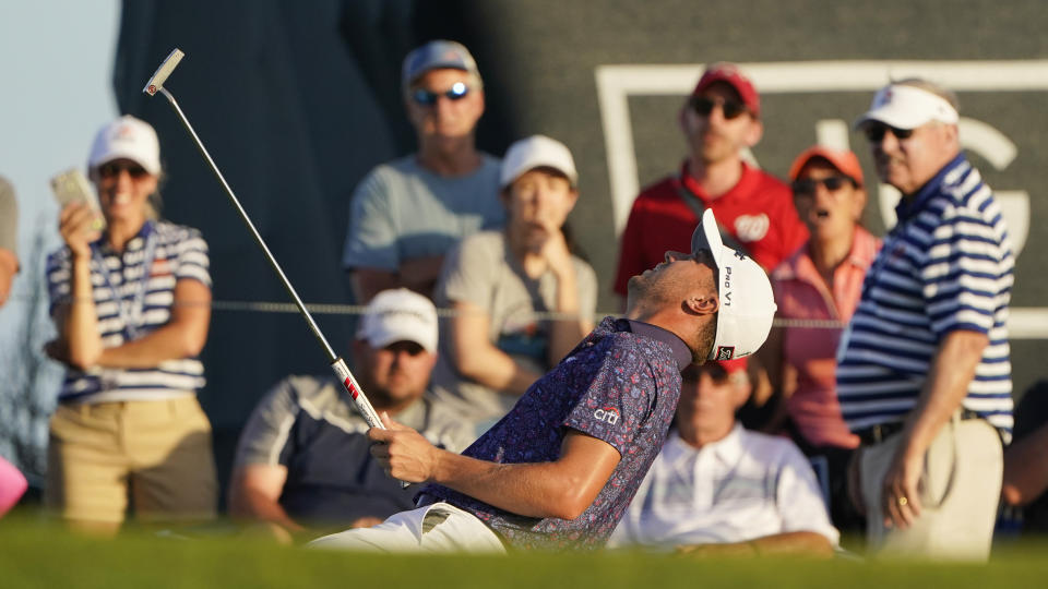 Justin Thomas reacts after missing a putt on the 18th hole during the second round of the PGA Championship golf tournament on the Ocean Course Friday, May 21, 2021, in Kiawah Island, S.C. (AP Photo/Chris Carlson)