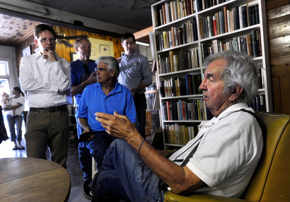 Author Larry McMurtry speaks with reporters at his store Booked Up in Archer City in 2012.