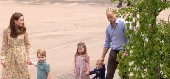 Princess Charlotte can be seen helping her one-year-old brother, Prince Louis, to walk in the above video. Photo: Kensington Palace