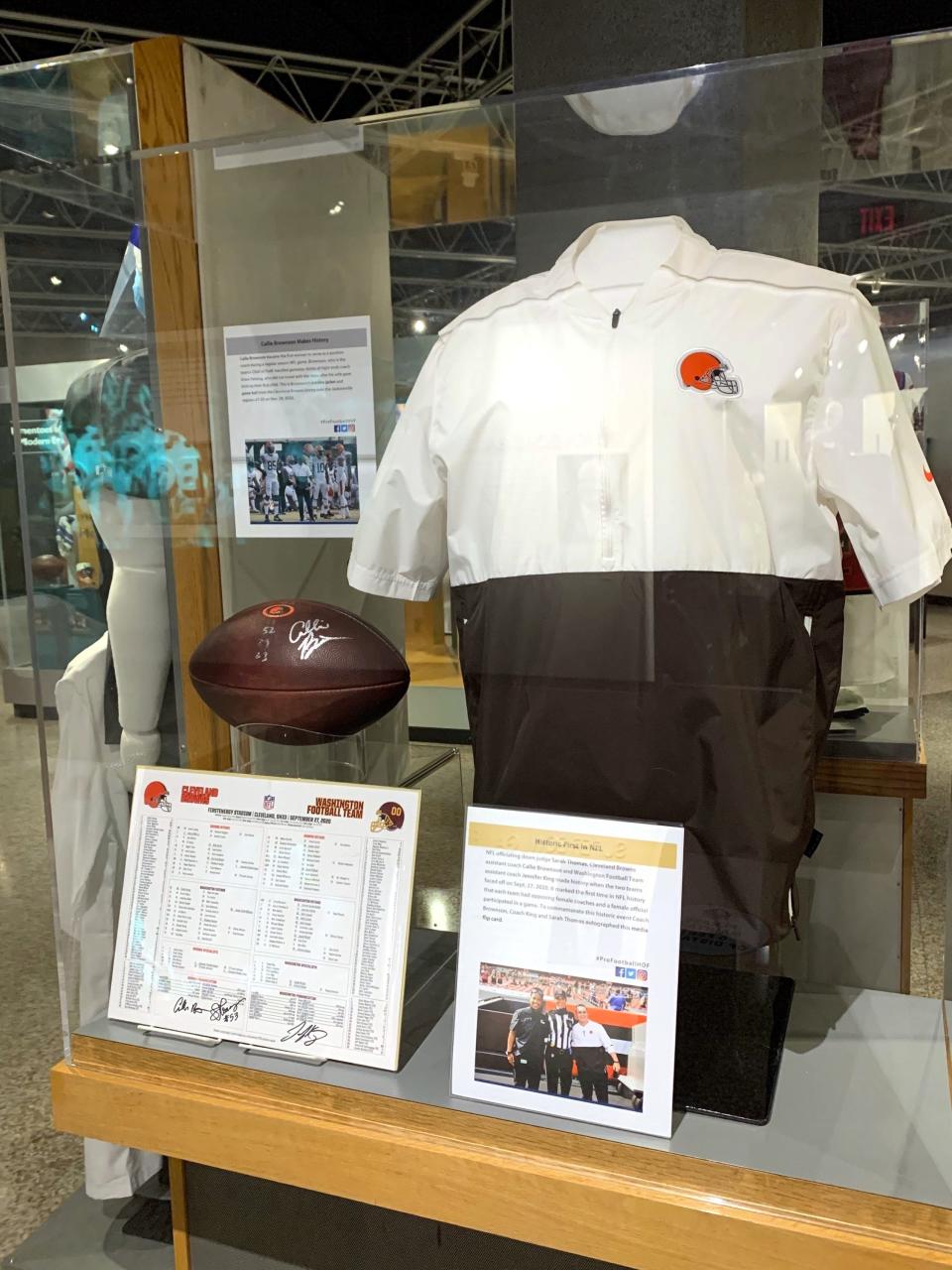 The sideline jacket and autographed game ball from Callie Brownson, the Browns chief of staff and first woman to serve as a position coach in an NFL game.