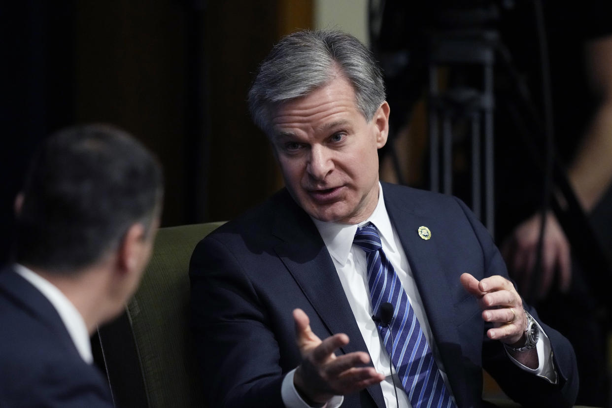 FBI Director Christopher Wray speaks at the Gerald R. Ford School of Public Policy at the University of Michigan, Friday, Dec. 2, 2022, in Ann Arbor, Mich. Wray is raising national security concerns about TikTok, warning Friday that control of the popular video sharing app is in the hands of a Chinese government "that doesn't share our values." (AP Photo/Carlos Osorio)