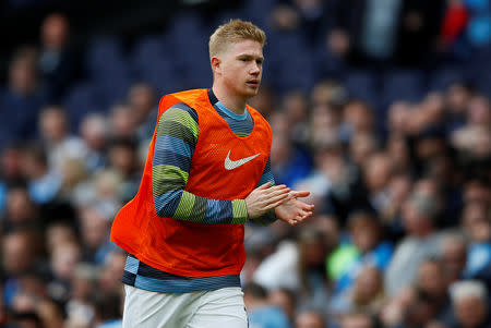 Soccer Football - Premier League - Manchester City v Burnley - Etihad Stadium, Manchester, Britain - October 20, 2018 Manchester City substitute Kevin De Bruyne warms up on the sidelines Action Images via Reuters/Jason Cairnduff