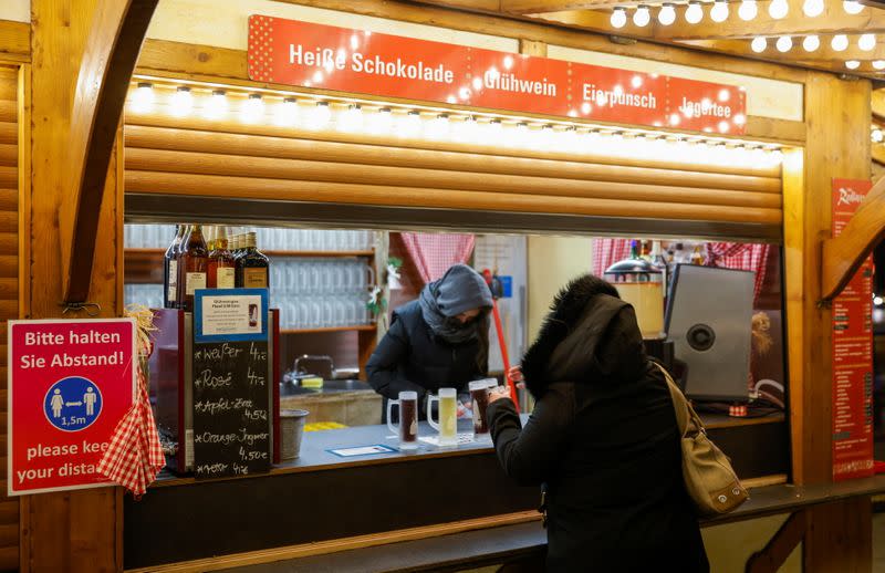 People visit a Christmas market as the spread of the coronavirus disease (COVID-19) continues in Berlin