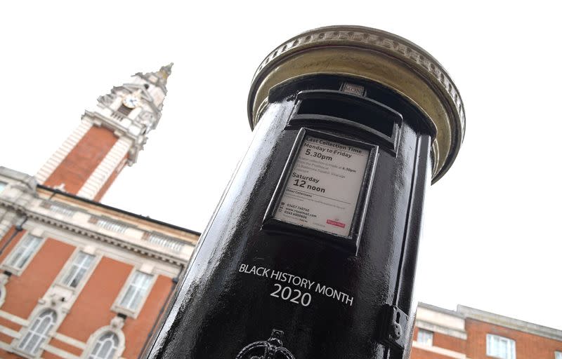 Royal Mail postboxes painted black instead of traditional red to honour Black Britons, unveiled as part of the forthcoming Black History Month, in London, Britain
