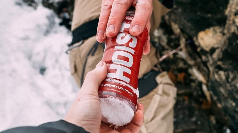 Hands Exchanging Hoist Bottle