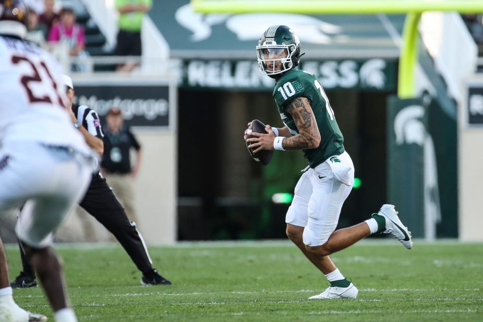 Michigan State quarterback Noah Kim looks to pass against Central Michigan during the first half at Spartan Stadium in East Lansing on Friday, Sept. 1, 2023.