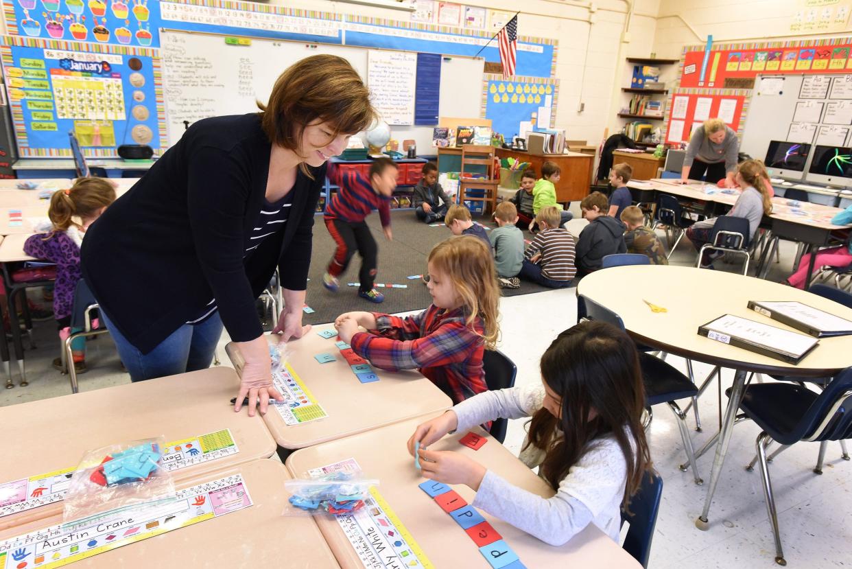 In this 2016 photo, San Pablo Elementary School teacher Michelle Dunavant works with her students.