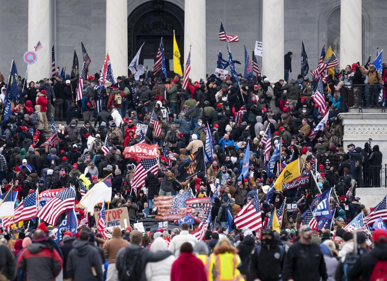 Donald Trump supporters take over the steps of the U.S. Capitol on Jan. 6, 2021. <a href="https://www.gettyimages.com/detail/news-photo/trump-supporters-take-over-the-steps-of-the-capitol-on-news-photo/1230453118?phrase=jan.%206%20insurrection%20us%20capitol&adppopup=true" rel="nofollow noopener" target="_blank" data-ylk="slk:Bill Clark/CQ-Roll Call, Inc via Getty Images;elm:context_link;itc:0;sec:content-canvas" class="link ">Bill Clark/CQ-Roll Call, Inc via Getty Images</a>